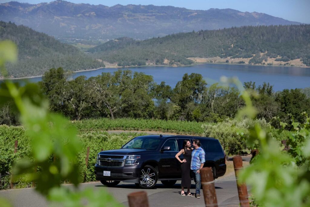 distance view of Ryan and Shannon in front of car